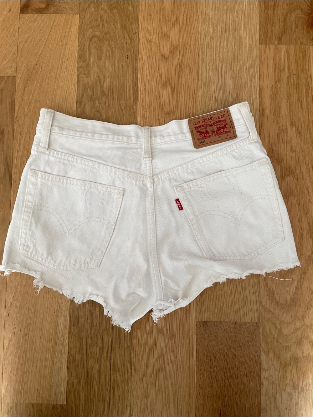 Levi's White Denim Cutoff Shorts with Raw Hem
